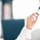 Back view of a woman talking on a headset