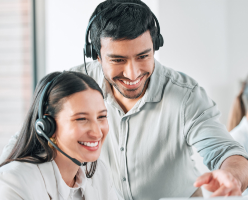 Collaboration, woman and man with headset in call center for client help