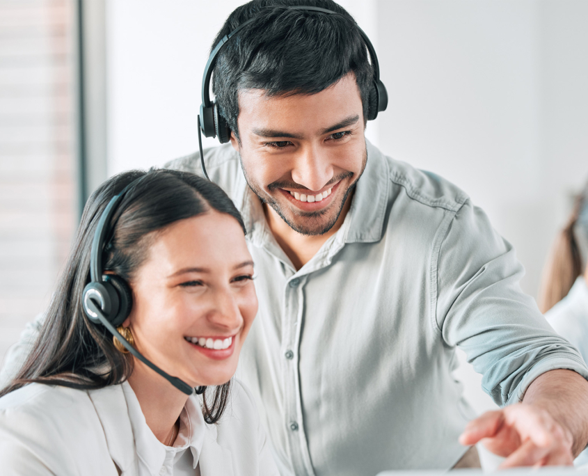 Collaboration, woman and man with headset in call center for client help