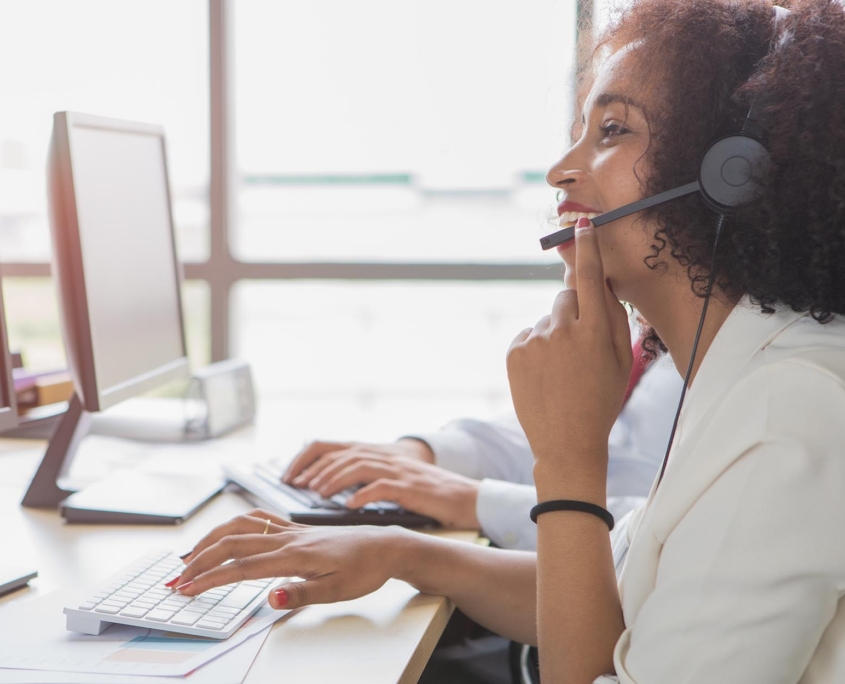 Hispanic person on phone call in call center